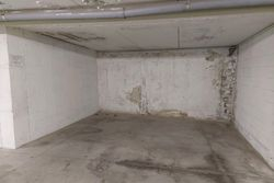 Three covered parking spaces for possible use as cellars - Lot 13321 (Auction 13321)